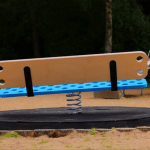 Adult ’Lazy bench’ design encourages parents to battle muscle