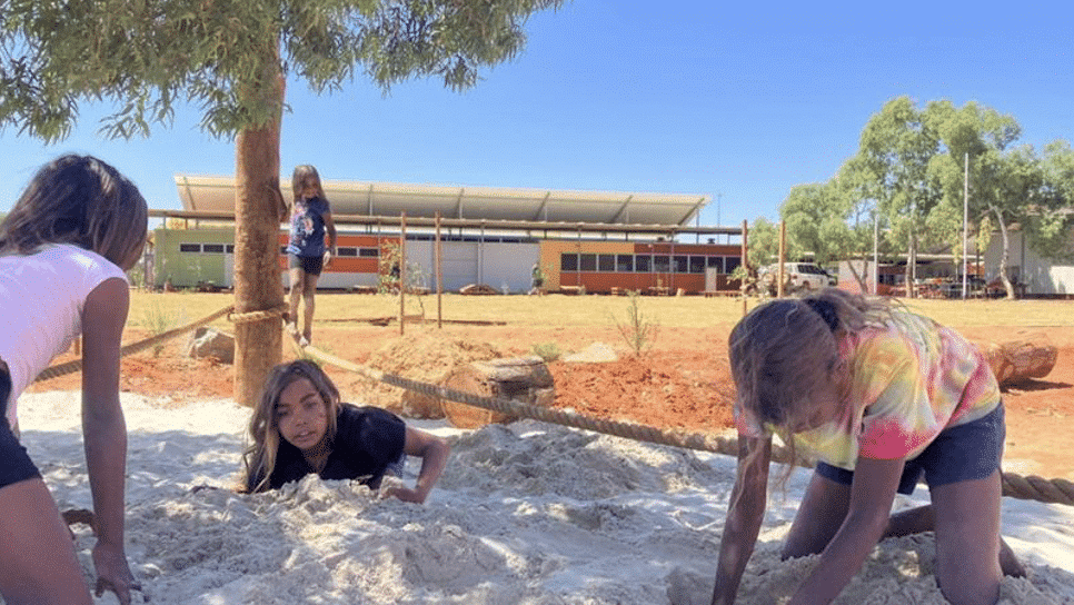 Remote school students enjoy beach-grade sand in new nature playground after delivery mix-up